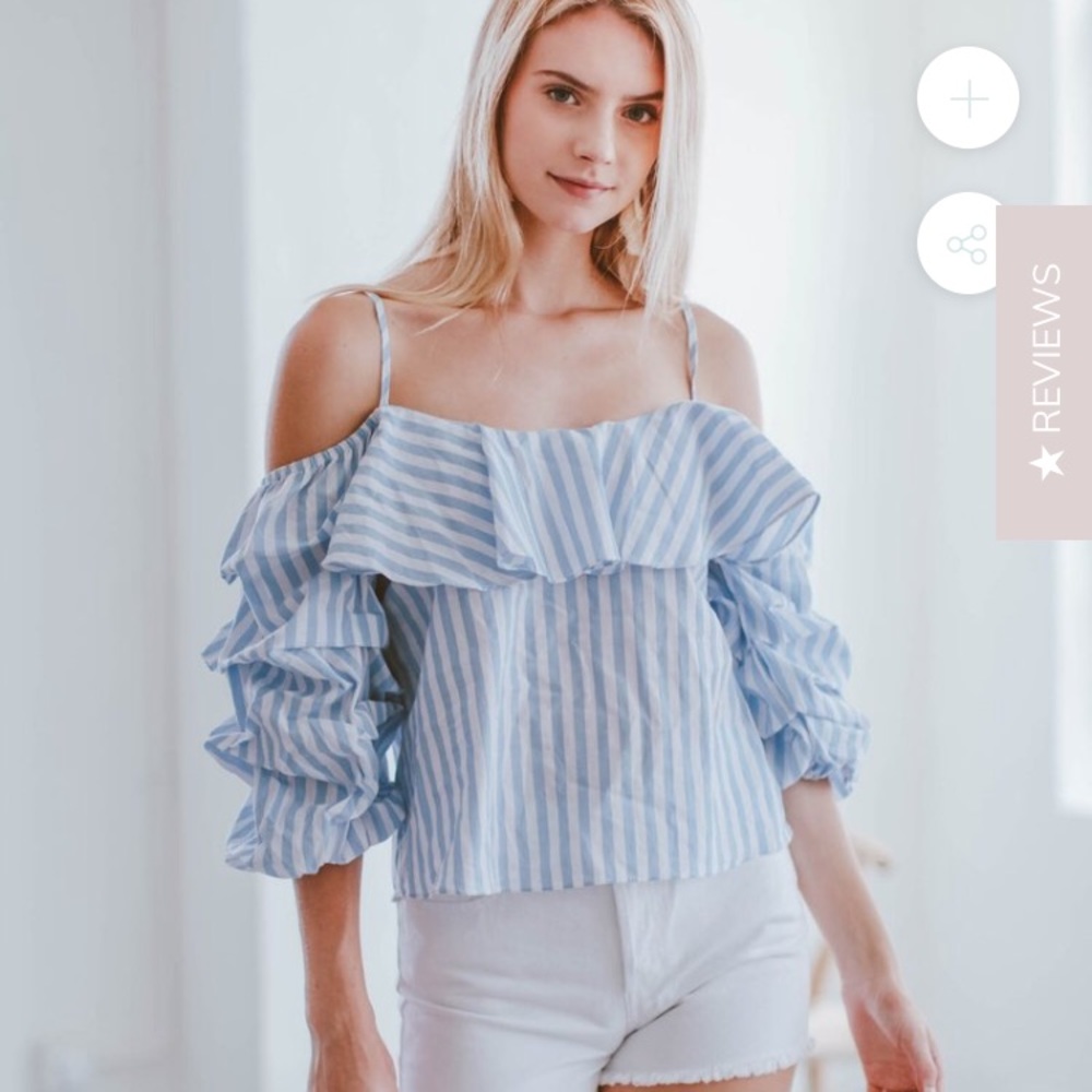 Blue and white striped cold shoulder top.